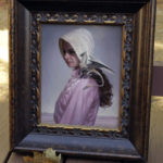 Oil painting by Ryan Pancoast of a frontier girl and a dragon.