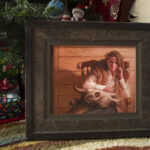 Oil painting by Ryan Pancoast of a woman and a skull.