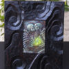 Undying framed and photographed upright.