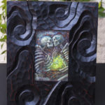 Undying framed and photographed upright.