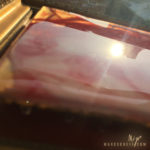 Venus, a painting in pencil, resin, acrylic, and gold leaf, all red and gold