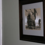 An ink drawing of a dragon and a wagon train by Ryan Pancoast.