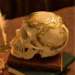 A gilded skull by Rhonda Libbey.