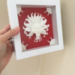 "Dragon Medallion" paper sculpture by Tiffany Budzisz