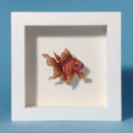 Summer Rain Color Study by Daria Aksenova. Hand-cut illustration of a fish suspended in a shadowbox structure.