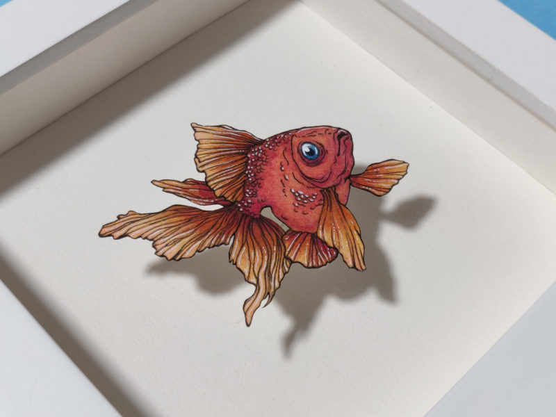 Summer Rain Color Study by Daria Aksenova. Hand-cut illustration of a fish suspended in a shadowbox structure.