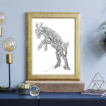 Mockup of the Capering Forest in a gold frame on a hearth