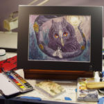 watercolor painting or an owl on a table easel