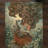 Medusa with unicorn on a field of lilies
