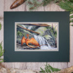 orange dragon and waterfall with logs