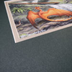 orange dragon and waterfall with logs