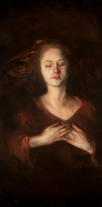 Girl with deep red hair laying in a deep, dark mist