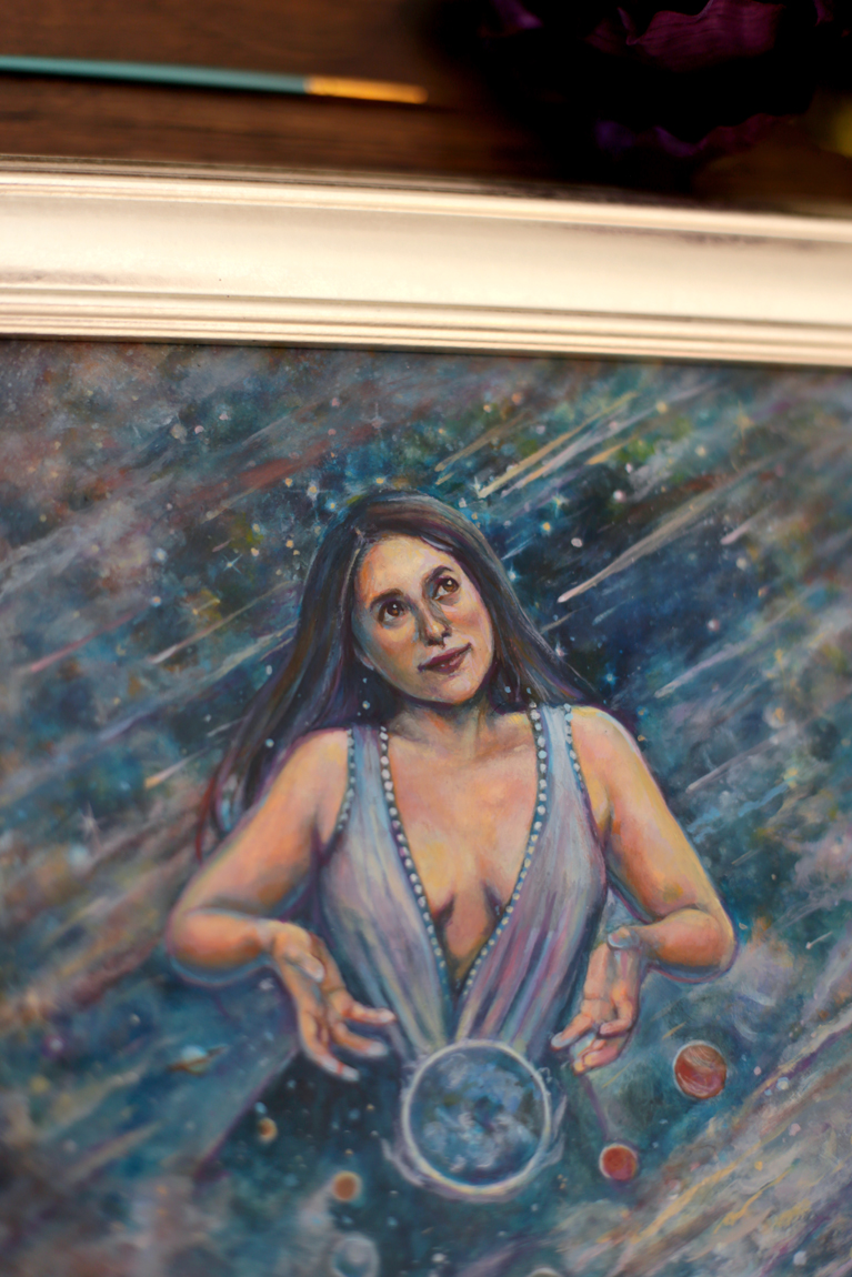 Woman letting go of a planet surrounded by stars and space