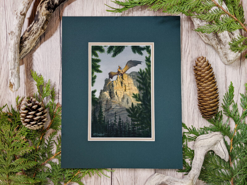 Golden Hour dragon standing on a cliff with wings out above a forest painted in watercolor photo of artwork in mat