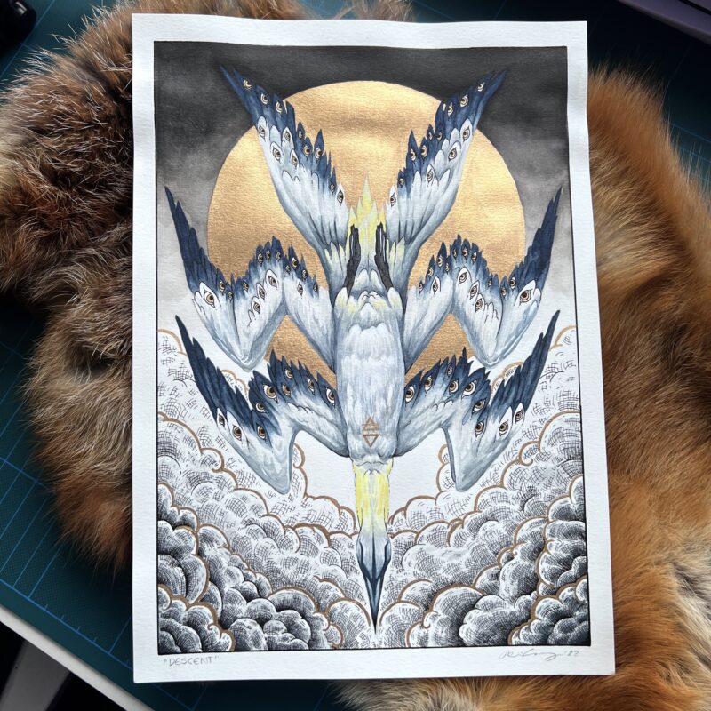 A watercolour and ink artwork depicting a diving gannet with six wings covered in eyes. The piece is laid on a fox fur and features gold gilding details.