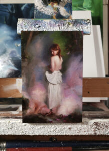 An oil painting of a girl surrounded by clouds, her back facing us as her dress is held around her waist. She is looking down, seeing that her legs have turned into chicken’s feet. She is a cursed figure.