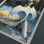 Close up view of the signature on the painting with the mat colors