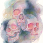 Pictured is a watercolor painting of three overlapping skulls floating amidst rich watercolor washes.