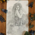 Graphite piece of a gorgon with snakes skeletons as hair.