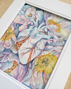 A watercolor painting of a blue heart is tangled within a cluster of blue peonies.