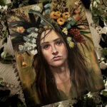 woman in floral headress in colors of autumn, gold, olive, red, brown