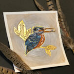 watercolor painting of a robotic kingfisher
