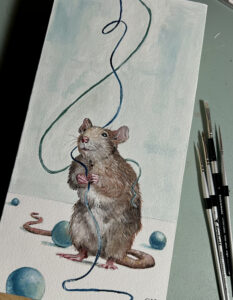 Painting of playful rat holding blue string with teal beads around the floor. Artist paintbrushes to the right of the work.