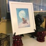 "Old Lady Moon" among the curios