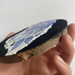 "Metamorphs de Mini Porcelaine, The Bearer of Non-time (Black-naped Oriole)" - by Christine R. Bay