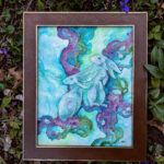 A watercolor painting of two bunnies sitting on purple roots. It is framed, surrounded by leaves from outdoors.