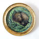 green dragon and cat painting in round gold frame