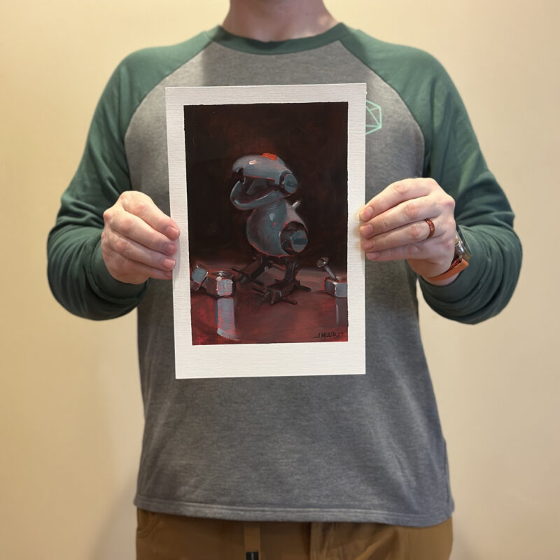 Aaron holding the painting.