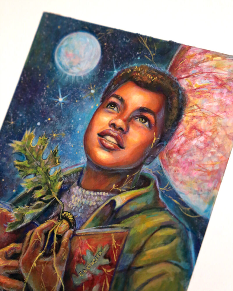 Painting of a Black young adult girl holding a red notebook and an acorn. The acorn has a couple of leaves and roots that extend below and all around. She's looking hopeful. Jupiter's moon Europa and Saturn's moon Enceladus are behind her as well as a field of stars.