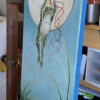 Side view of painting of frog flying away holding onto a trio of balloons
