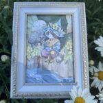 Framed painting of a Raccoon fishing