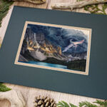Flat scan view of a white dragon flying over a lake similar to Moraine Lake in Banff, Canada. A dark storm rises from behind the mountains, lit in a blazed line across the center from the setting sun.