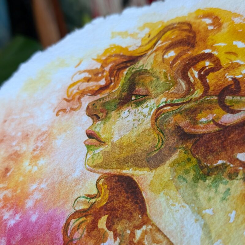 "Autumn Fae" by Laura Garabedian - watercolor painting of a fae woman's portrait in profile with curlly auburn hair looking side eye at the viewer on an abstracted background of golds and pinks