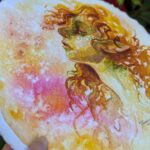 "Autumn Fae" by Laura Garabedian - watercolor painting of a fae woman's portrait in profile with curlly auburn hair looking side eye at the viewer on an abstracted background of golds and pinks