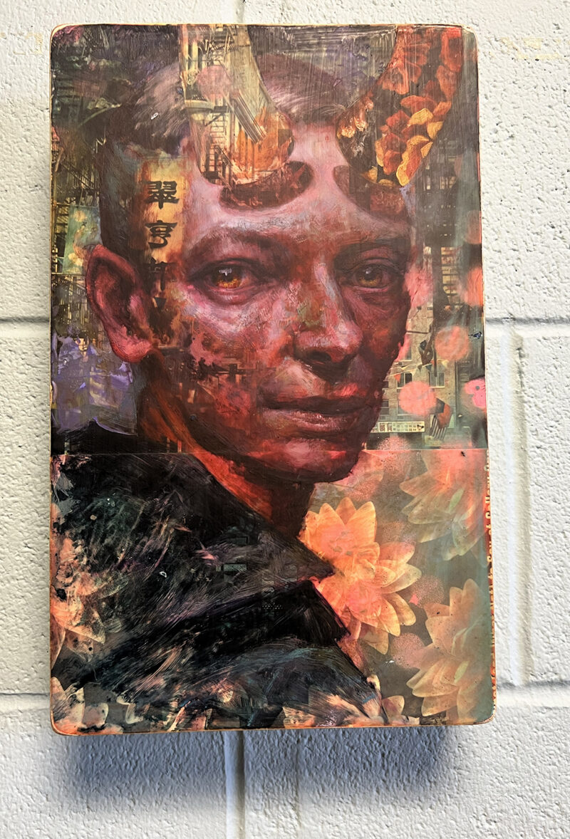 Mixed media portrait of a variant of Hellboy, but with a Tilda Swinton influence on a wall.