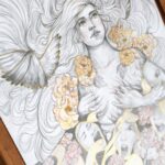 A tilted photo of a mixed media piece. A woman ripping away fabric from her skin. This photo shows how the light makes the metallic details shine