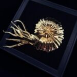Golden ammonite with elegant tentacles