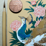 Detail from a painting on a square coaster of a pied peahen surrounded by pink peonies. The detail focuses on the peahen's head and is photographed with a penny and a brush for scale.