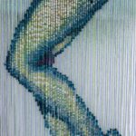 Reverse mermaid - salmon head created with sequin film and shell atop beaded fringe legs