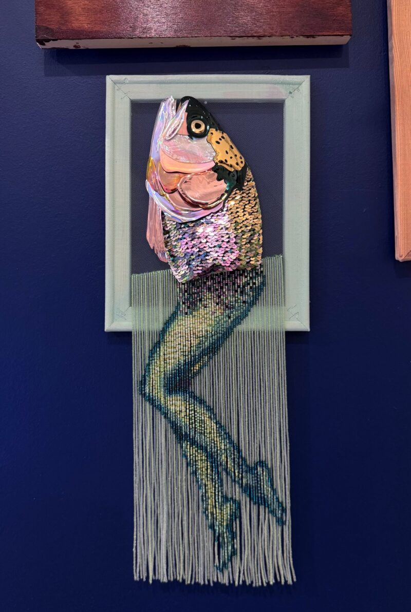 Reverse mermaid - salmon head created with sequin film and shell atop beaded fringe legs