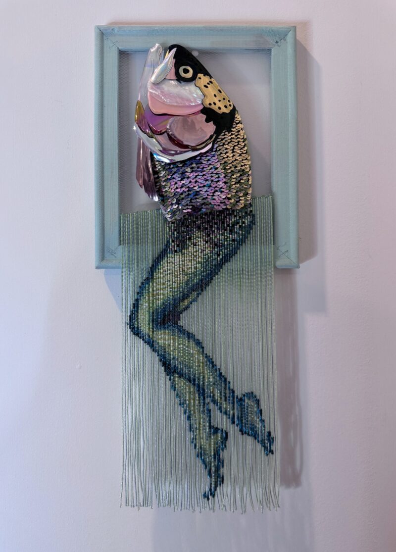 Reverse mermaid - salmon head created with sequin film and shell atop beaded fringe legs