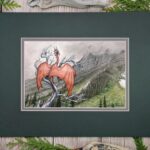 Photo of artwork of a rusty red dragon perched on a twisted dead tree looking out at a misty mountain range.