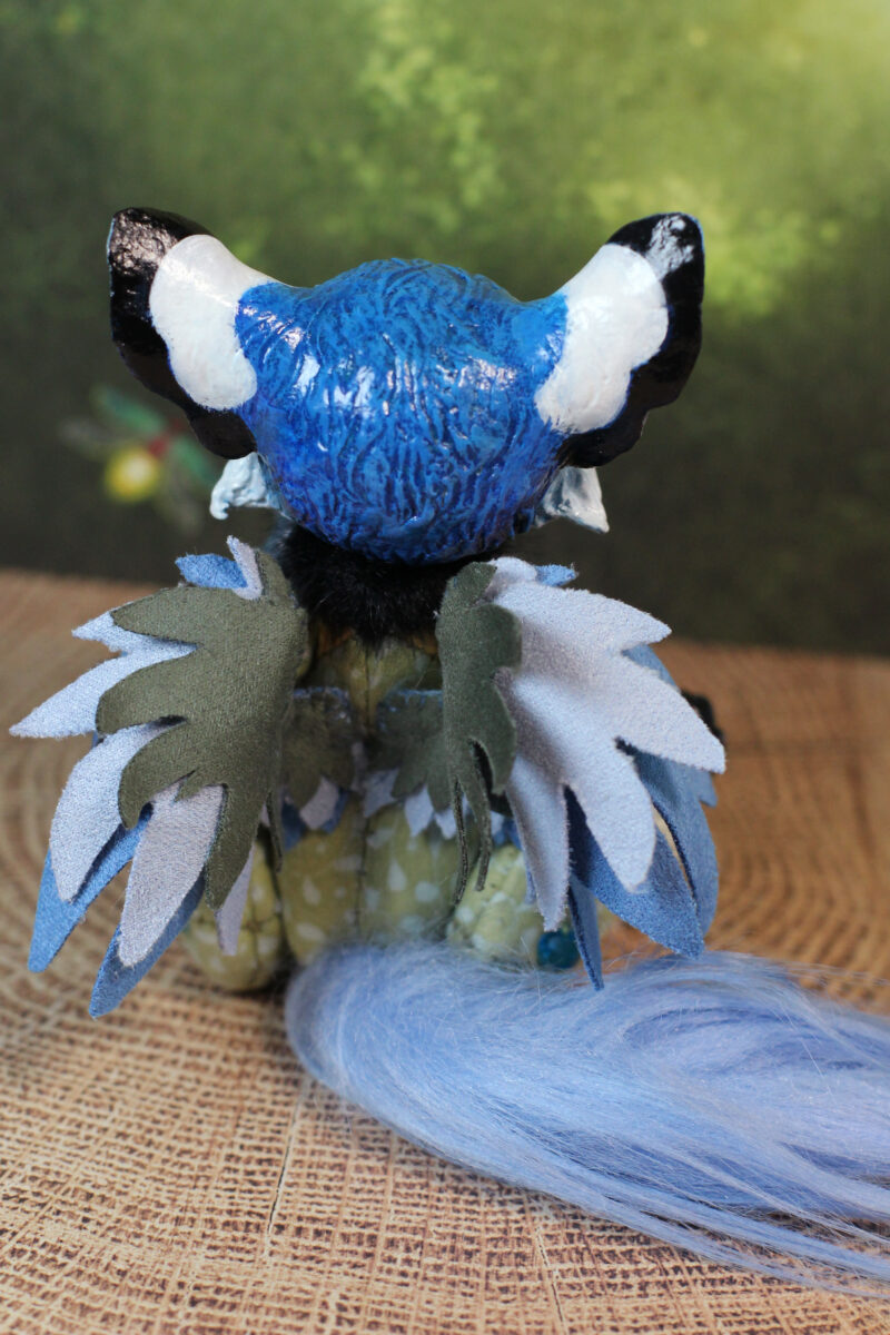 original art doll of a bluetit mixed with a cat standing on its hind paws made by Svetlana Polupanova