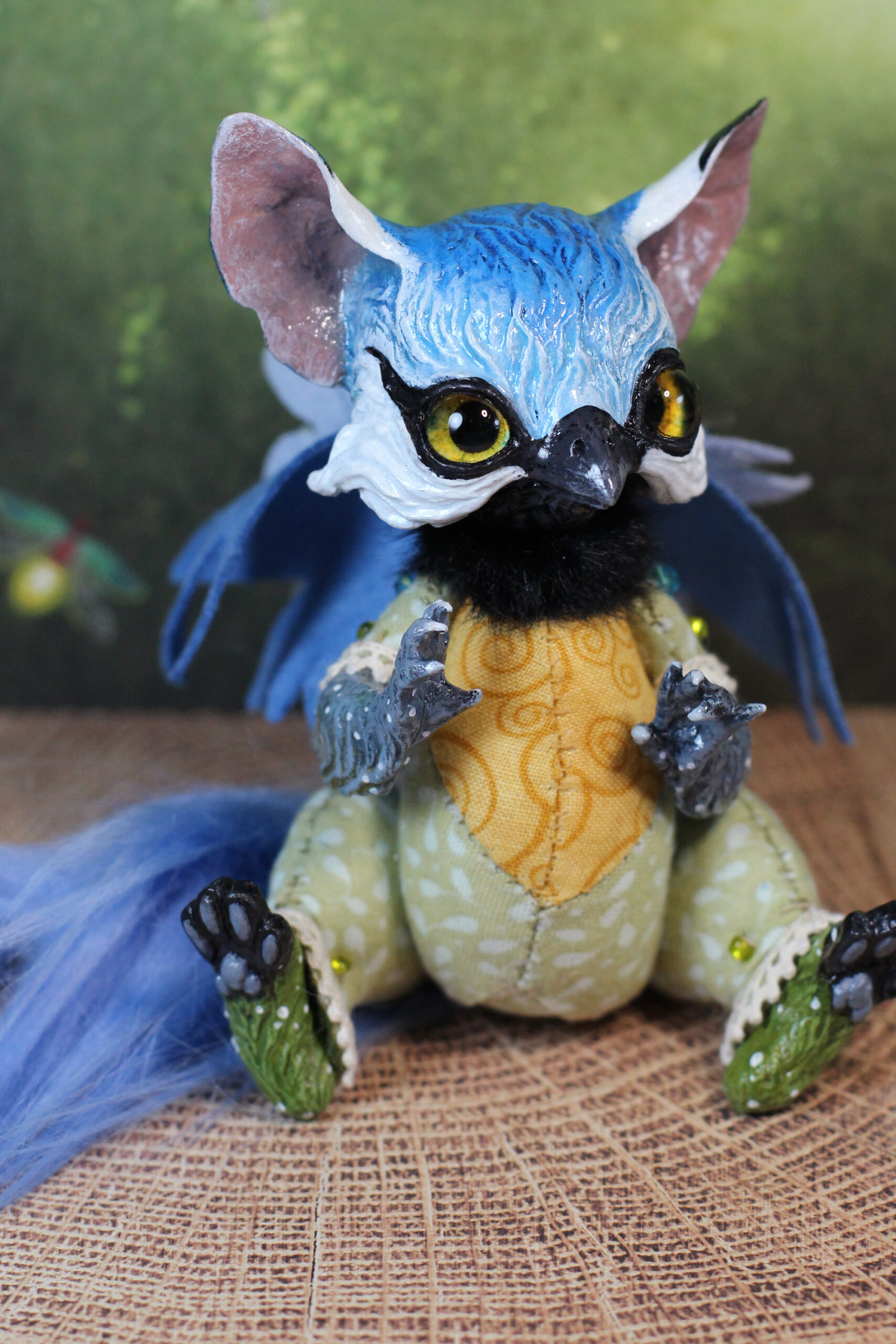 original art doll of a bluetit mixed with a cat sitting made by Svetlana Polupanova