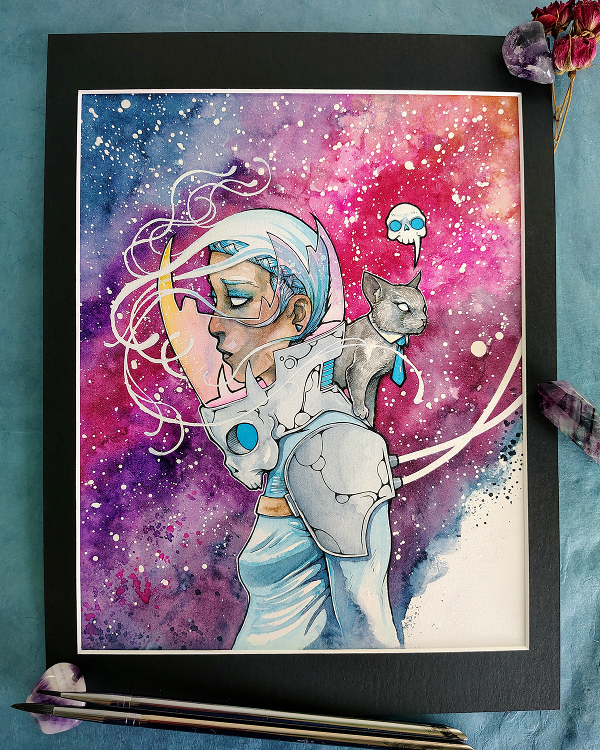 Photo of This Cosmic Business watercolor painting set in black mat board.