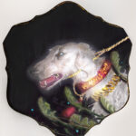 A fantasy borzoi adorned in shining gold is caught in a cameras bright flash while standing in tall grass. painting on a Quatrefoil found object.